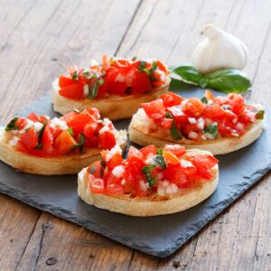 brushetta on crostini on a plate