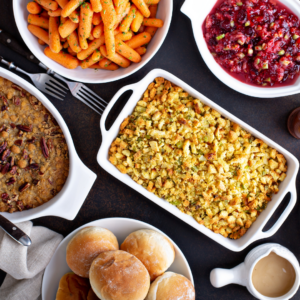 Table of colorful thanksgiving dishes