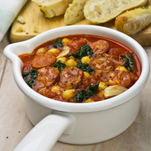 bowl of sausage potato soup with kale