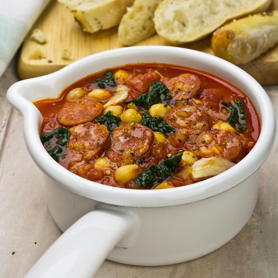 bowl of sausage potato soup with kale