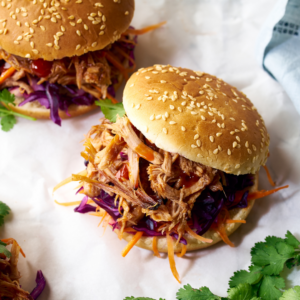 Maple pulled pork sandwiches on sesame buns