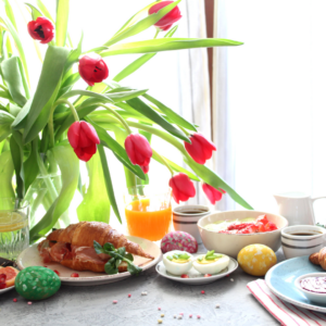 Table set for brunch with tulip centerpiece