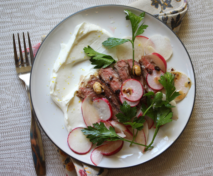 strip steak with yogurt and radishes